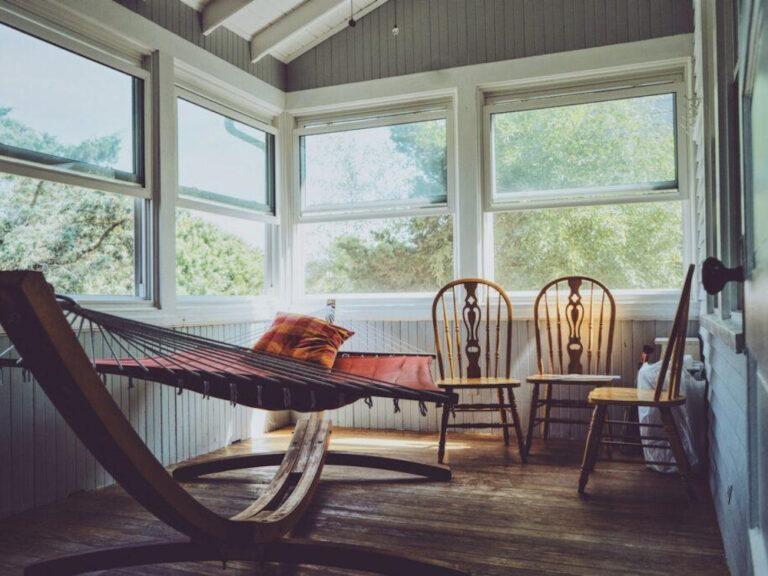 hammock and chairs in sun room